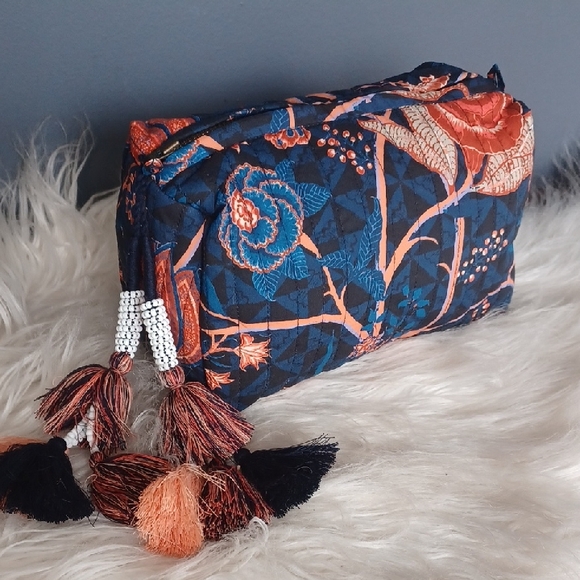 Ulla Johnson Handbags - Ulla Johnson  floral cosmetic bag  with tassels